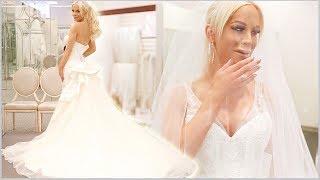 TRYING ON WEDDING DRESSES | Gigi
