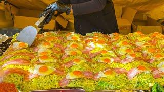 japanese street food - hiroshima style okonomiyaki お好み焼き hiroshimayaki