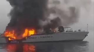 The Financial Guard of the Italian Ministry of Finance Boat burned and sank off the coast of Africa.