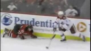 Keith Ballard huge hip check on Rod Pelley