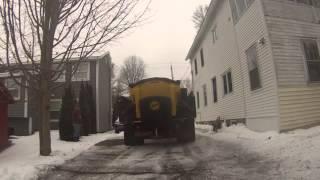 Loading Poly Caster with sand and sanding driveways