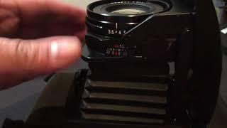 Fuji GF670: how to open and close the lens folder