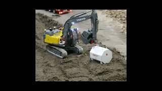 Bulldozer Battle: Multiple Dozers Flatten Huge Dirt Pile