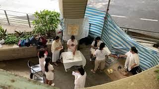 Assembly of the Unión Espiritista Cristiana de Filipinas, Inc. under a Flyover in Hong Kong