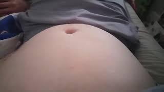 Kids playing with Dads Belly