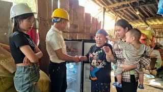 Lucky to go with Mr. Hung to give charity gifts to an 85 year old lady (A Refrigerator).