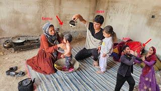 Daily life of Ayas and Fatima's family: Bathing Fatima's children in nomadic style(kohrig family)