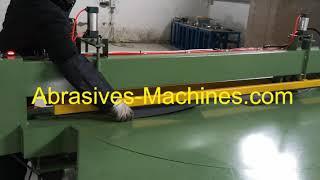 Abrasive cutting to length machine