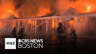 Flames rip through Massachusetts strip mall, destroying businesses