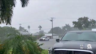 Heavy rains flood streets in Tequesta, Jupiter