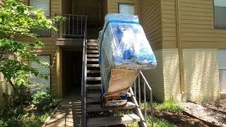 Moving an Antique heavy dresser upstairs by professional mover at Rescue Moving services Lewisville