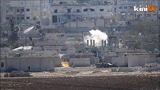 Turkey walks tightrope over Kobane after Peshmerga deployment