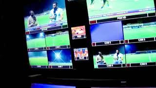 Live football production coverage and broadcasting, warm-up session behind camera