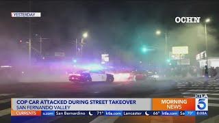 Police car attacked, window smashed at Los Angeles street takeover