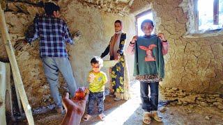 Building a shelter: Plastering with the efforts of nomadic girls and a kind man