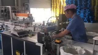 Double channels facial tissue bundling machine
