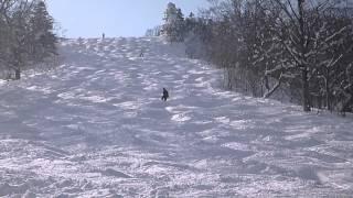 Snowboarding on irregular moguls in Eboshi ski resort 2