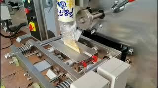 Automatic bag filling packaging machine.