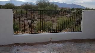 View fence and double gate in the Tortolitas Tucson - Affordable Fence and Gates