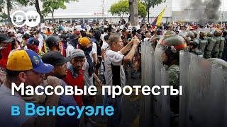 Стычки с полицией и снос памятников Чавесу: протесты в Венесуэле после победы Мадуро на выборах