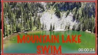 HARD RIDE TO SWIM IN A MOUNTAIN LAKE.....