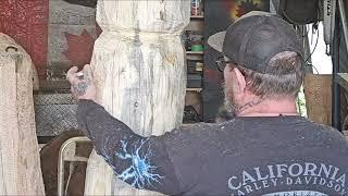 Totem of the pumpkins chainsaw carving for Halloween.