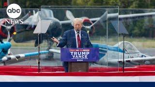 Trump delivers rally speech behind bulletproof glass in North Carolina