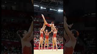 #GymnastTeam #LivePerformance #AcrobaticGirls #HumanPyramid #SportsArena  #GymnasticsShow