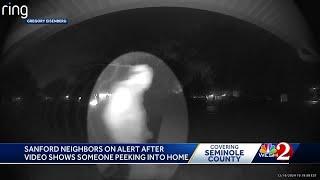 Neighbors in Sanford on alert after videos show a window peeper