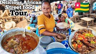 Trying the cheapest and most delicious street food in Akodessewa market lomé Togo  west Africa 