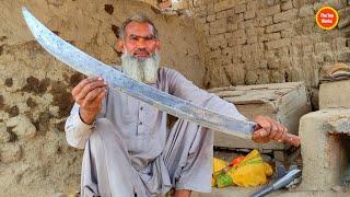 Talented Blacksmith making a Great Sword - The top works