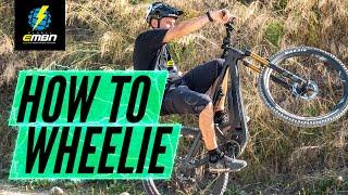 How To Wheelie On An Electric Mountain Bike | E Bike Skills