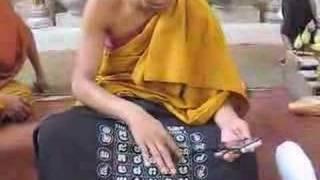 Monk Teaches Khmer Alphabet at Angkor Wat