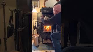 Lighting the wood cookstove with just a match and an open window. Thanks to our followers suggestion