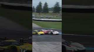 Nick Tandy in the Porsche passes Bourdais in the Cadillac.