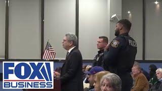 Edison, NJ resident removed from town meeting for waving American flag protests 'prop' ban