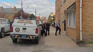 Partially dismembered body found in a fridge inside an apartment building