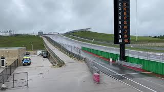 Lamborghini Huracan Super Trofeo Racecar with Rooster Tail in the rain!