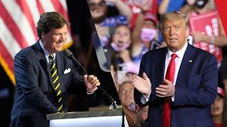 Trump attends hurricane relief benefit with Tucker Carlson in Glendale, Arizona