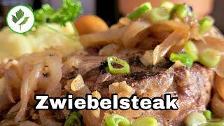 Zartes, saftiges Zwiebelsteak vom Schweinenacken - ein echter Genuss