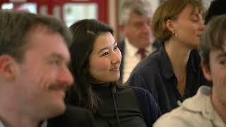 What is the academic community like at Wolfson College, Cambridge?