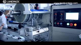 sanitary napkin packaging machine,flow pack machine, flow wrap machine, pillow packing machine,