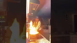 GIRL LEARNS NOT TO USE WATER ON GREASE FIRE THE HARD WAY  #viral