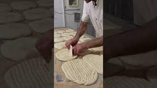 Iranian men baking Barbari bread | Baking traditional bread #bakingbread #bakery #barbari