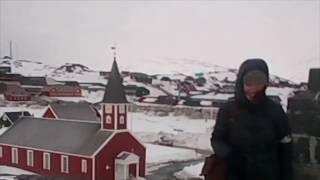 Nuuk, Greenland: at the feet of the statue of founder Hans Egede, with Nuuk Cathedral in Background