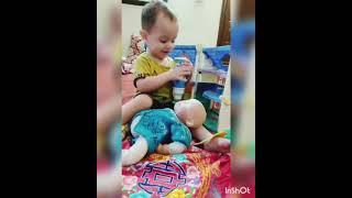 Taha Youzarsif messed his doll's face with powder.