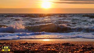 Dawn and sunrise over the Sea of Azov. Arabat Strilka, Ukraine. Video 4K