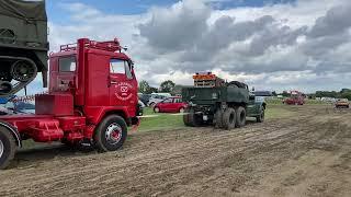 Diamond T prime mover tows a Vintage truck with a Halftrack and a GMC truck onboard !