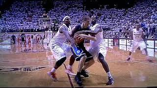 dook's (duke's) Jon Scheyer travels across the court, nothing called.