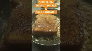 Fried PB&J sandwich, golden in butter, drizzled with maple syrup—pure heaven in every bite! #food